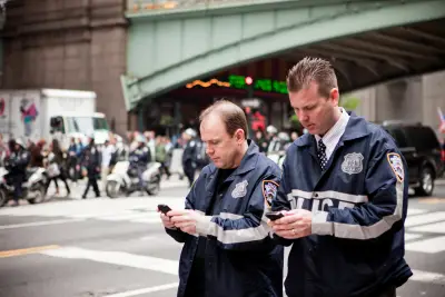 Early Addition: More pictures of cops looking at their phones